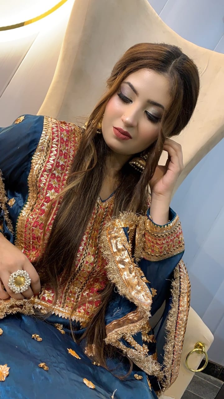 Bridal makeup with floral jewellery and mint outfit